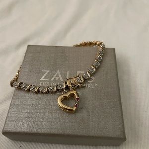 Gold and Ruby tennis bracelet